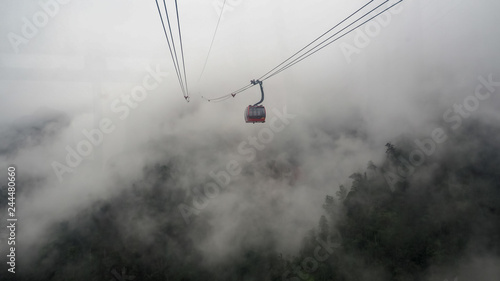 Cable car in winter. Over the mountains