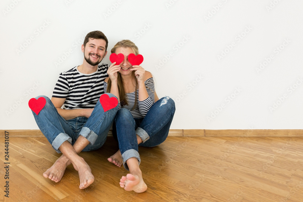 Funny young couple is celebraiting valentines day. Funny young couple is celebraiting valentines day.