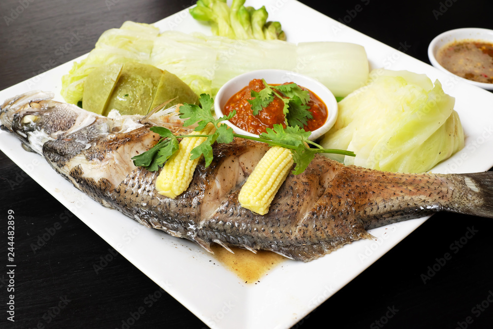 Snapper steamed with vegetables in Thailand. Snapper steamed with vegetables in Thailand.