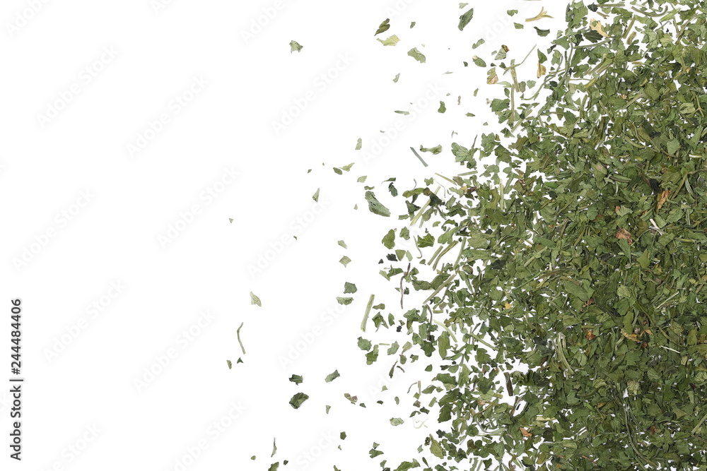 Chopped dry parsley leaves, pile isolated on white background, top view Chopped dry parsley leaves, pile isolated on white background, top view