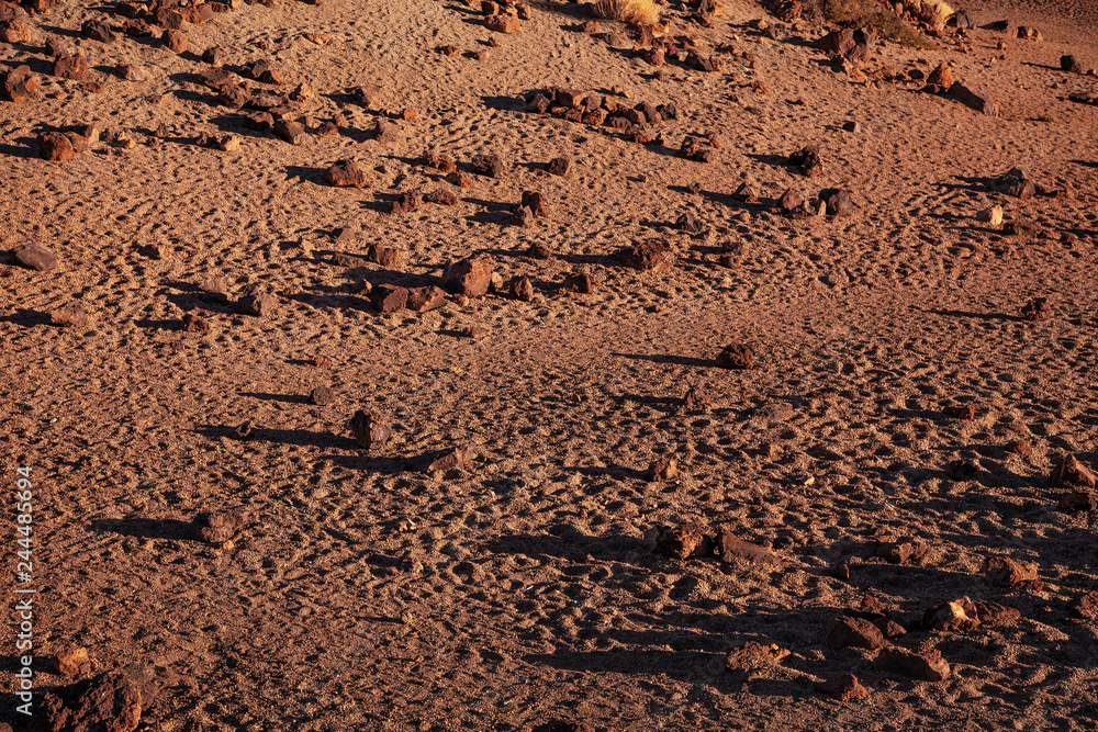 Background photo. Sand and stones in sunny weather. Background photo. Sand and stones in sunny weather.
