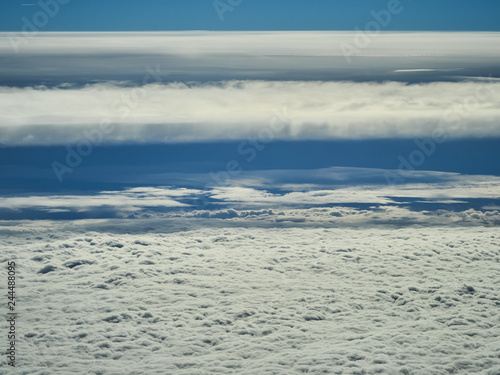 Clouds as viewed out the window of an airplane