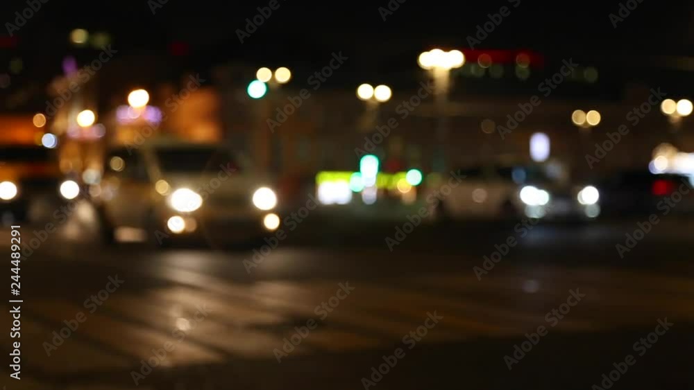 Blur view of traffic in illuminated city at night or evening Blur view of traffic in illuminated city at night or evening