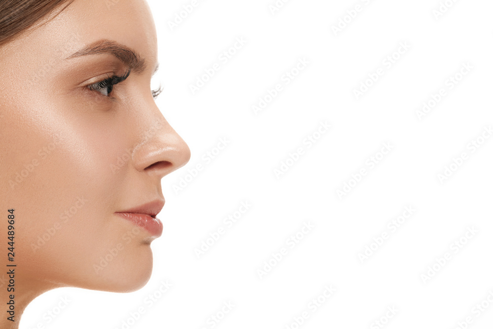 The beautiful female face. The perfect and clean skin of face on white. The beauty, care, skin, treatment, health, spa, cosmetic concept The beautiful female face. The perfect and clean skin of face on white. The beauty, care, skin, treatment, health, spa, cosmetic concept