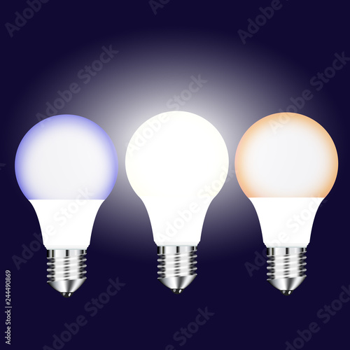 Vector drawing three bright LED lamps with different glow on a dark background
