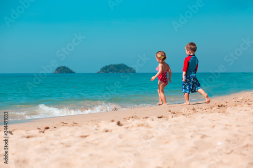Little girl and boy on the beach, Koh Chang island