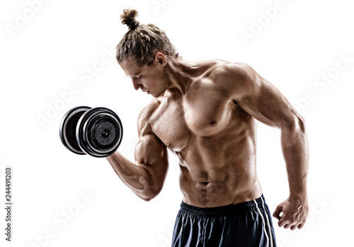 Athletic man doing exercises with dumbbell at biceps. Photo of sporty man with naked torso on white background. Strength and motivation