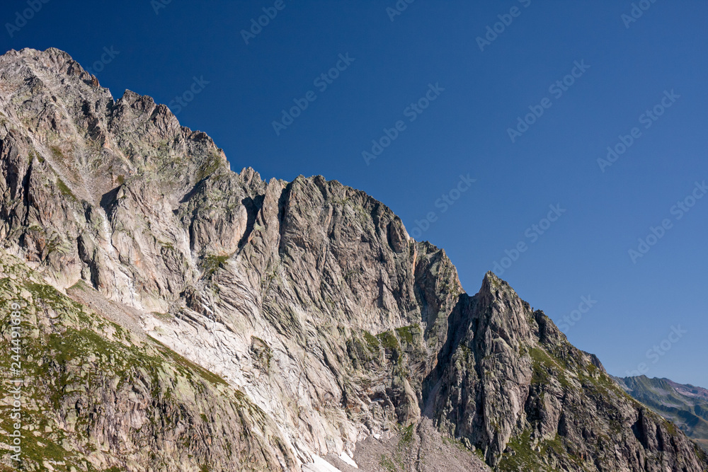 Panoramic view of the rock faces of Monte Cassina Baggio in the upper Bedretto valley in Switzerland