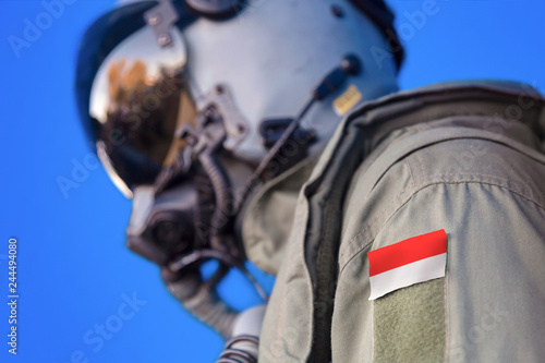 Air force pilot flight suit uniform with Indonesia flag patch. Military jet aircraft pilot 