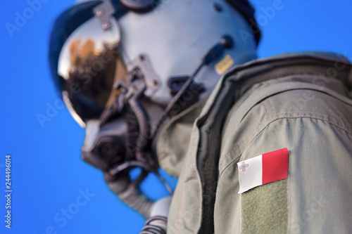 Air force pilot flight suit uniform with Malta flag patch. Military jet aircraft pilot 