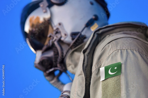 Air force pilot flight suit uniform with Pakistan flag patch. Military jet aircraft pilot 