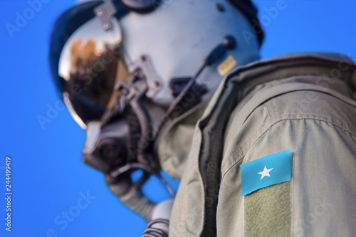 Fototapeta Naklejka Na Ścianę i Meble -  Air force pilot flight suit uniform with Somalia flag patch. Military jet aircraft pilot	