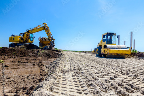 Wallpaper Mural Trace of huge road roller with spikes to compact soil at construction site Torontodigital.ca