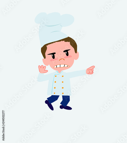 Chef points angrily to his left.