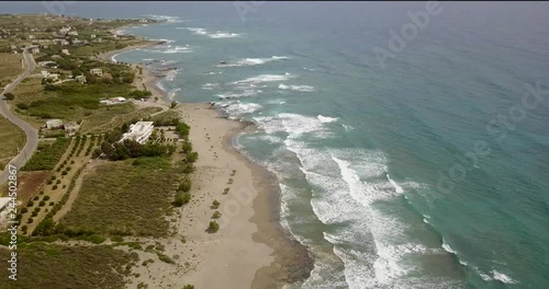 beautiful view from the top of the ocean with waves photo