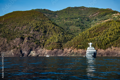 Superyacht at anchor in a bay along the Ligurian Coast