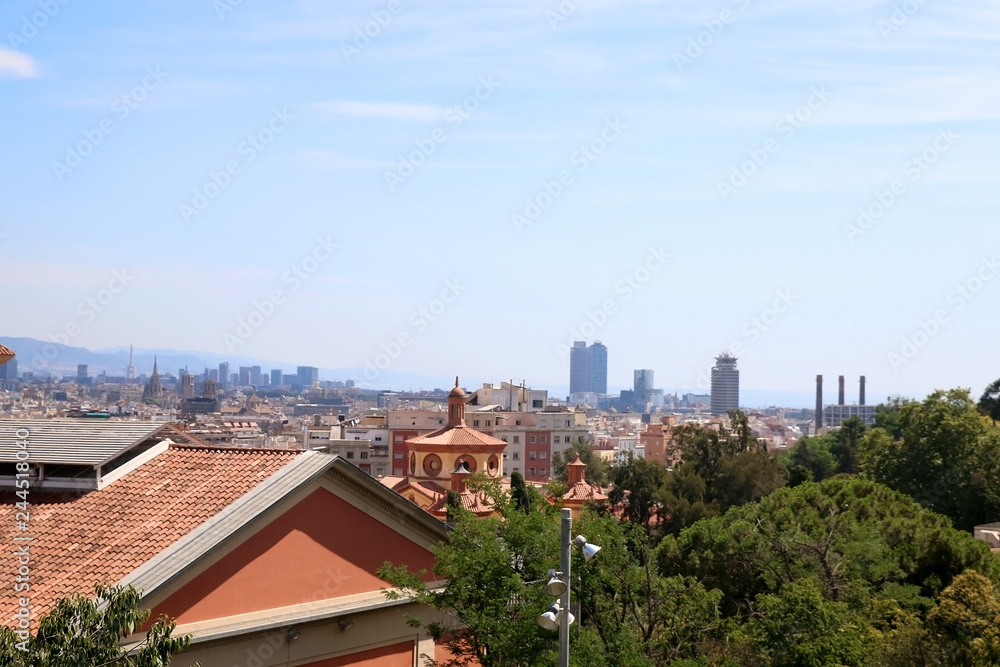 Aerial view of Barcelona, Spain from Montjuïc hill on a sunny day.