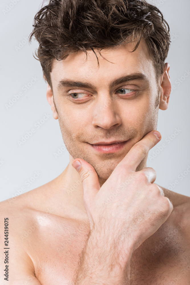 portrait of handsome pensive man isolated on grey portrait of handsome pensive man isolated on grey