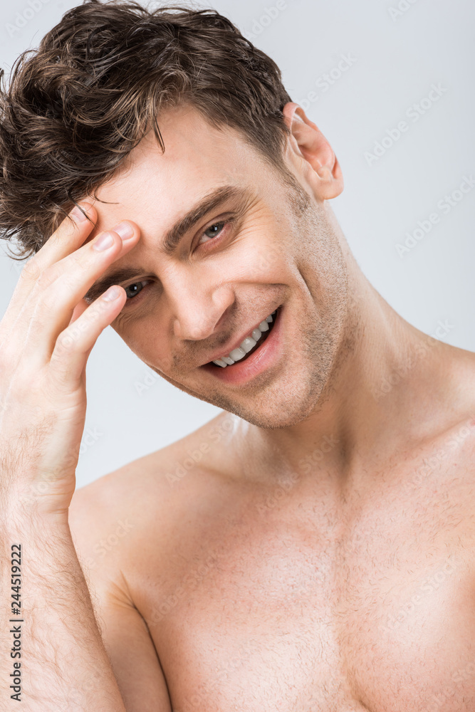 portrait of handsome laughing man isolated on grey portrait of handsome laughing man isolated on grey