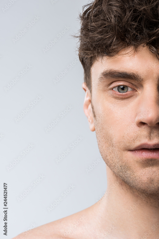 Obraz premium portrait of handsome young man isolated on grey