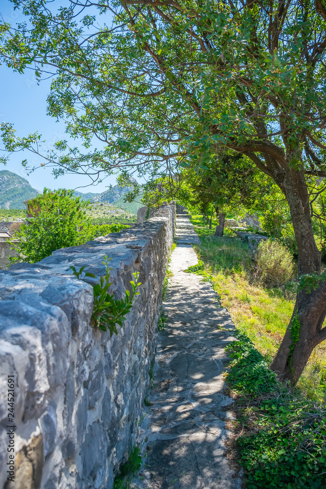 Medieval stone fortress is located high in the mountains. Medieval stone fortress is located high in the mountains.