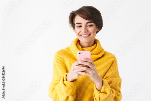 Happy cheerful girl wearing hoodie standing