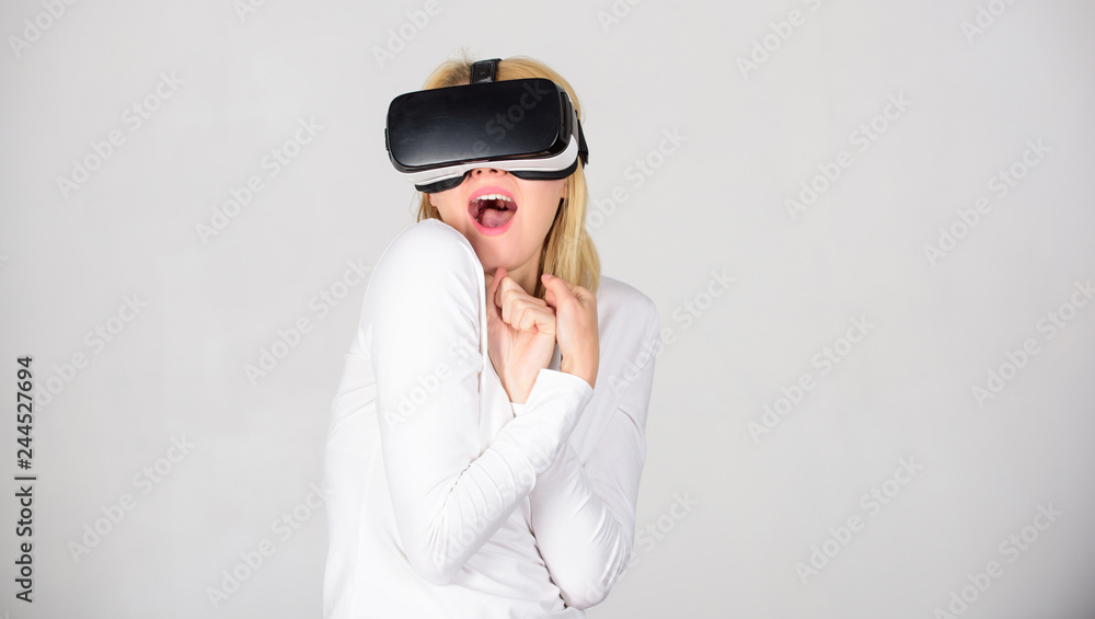 Woman using virtual reality headset. A person in virtual glasses flies in room space. Pretty woman playing game in virtual reality glasses. Virtual reality headset. Woman using virtual reality headset. A person in virtual glasses flies in room space. Pretty woman playing game in virtual reality glasses. Virtual reality headset.