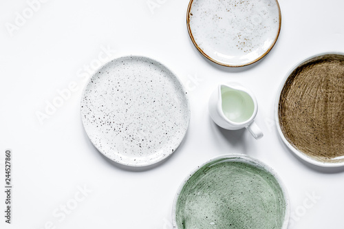 Фотография ceramic tableware top view on white background mock up