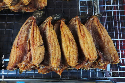 Street Food Thailand, Deep Fried Dried Fish at Fresh market in Thailand at Fresh market in Thailand