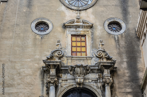 Carved Baroque portal of Santo Stefano Church also known as church of Purgatory (Chiesa del Purgatorio, 1668) at Piazza Giovanni in Cefalu, Sicily, Italy. photo