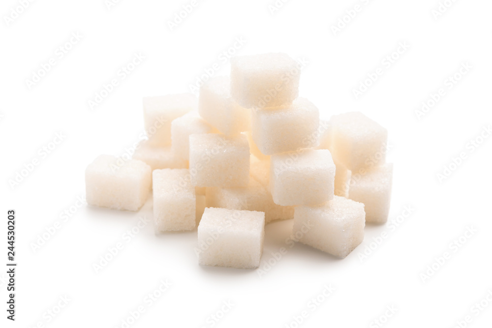 Heap of sugar cubes isolated on white background
