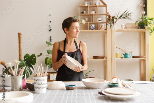 Young woman ceramic and pottery products