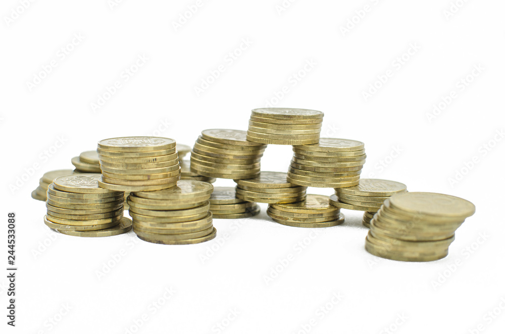 coins on an isolated background. Saving money, accumulating for the realization of a dream. coins on an isolated background. Saving money, accumulating for the realization of a dream.