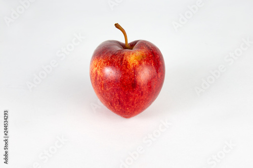 Red apple in shape of heart