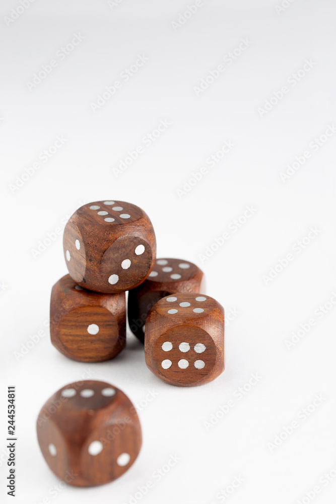 Dice wooden pile on white background Dice wooden pile on white background