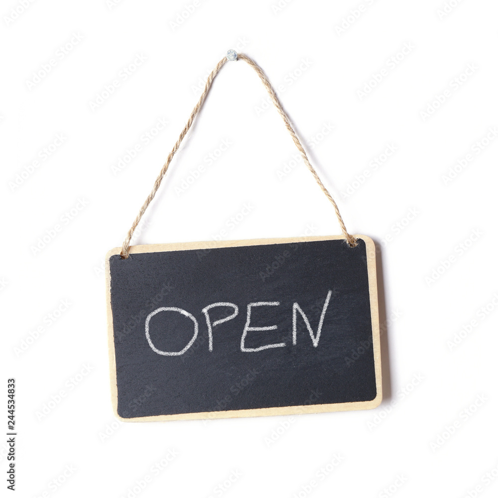 small blackboard sign with the word open written on it in chalk        