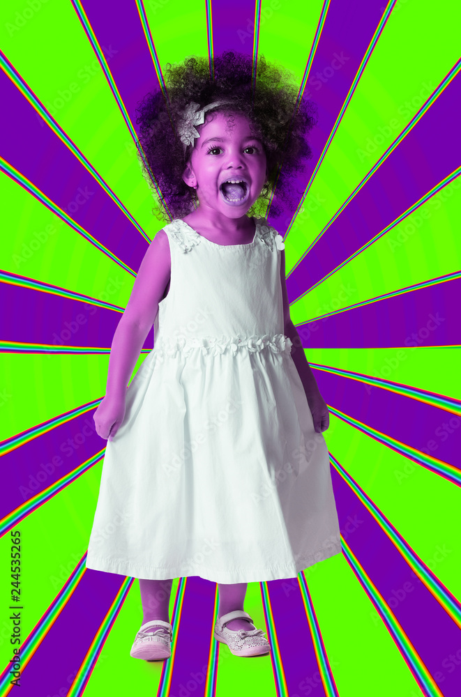 Neon portrait of a preschool cheerful girl full length. Kid on geometric background Neon portrait of a preschool cheerful girl full length. Kid on geometric background