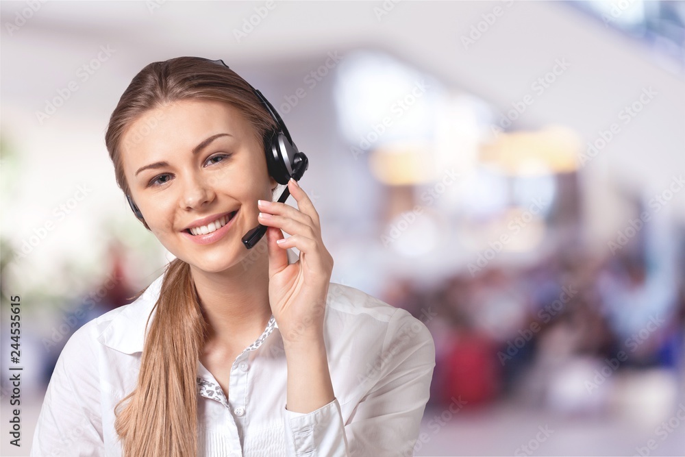 Young woman face with headphones, call center Young woman face with headphones, call center