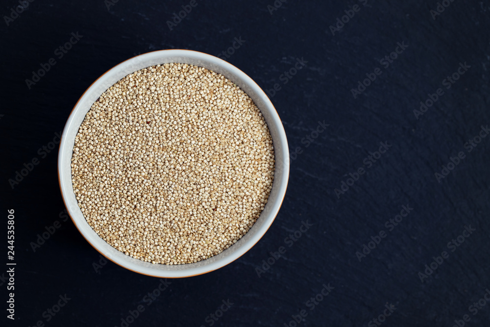 uncooked quinoa on bowl uncooked quinoa on bowl