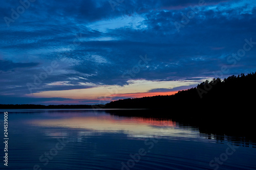 Fototapeta Naklejka Na Ścianę i Meble -  Beautiful panoramic view of the sunset over Lemiet lake in Mazury district, Poland. Fantastic travel destination.