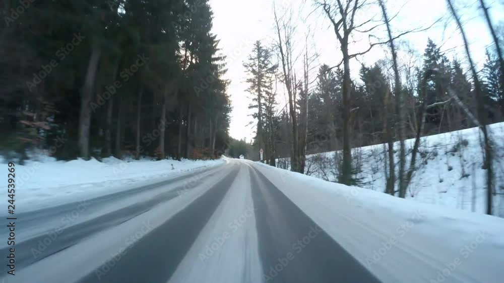 Snowy road. Dangerous situation from winter traffic in National park Sumava, Czech Republic, Europe. Video from action camera with engine sound. Snowy road. Dangerous situation from winter traffic in National park Sumava, Czech Republic, Europe. Video from action camera with engine sound.