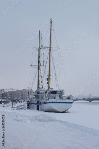 The ship winter on the river where the ice