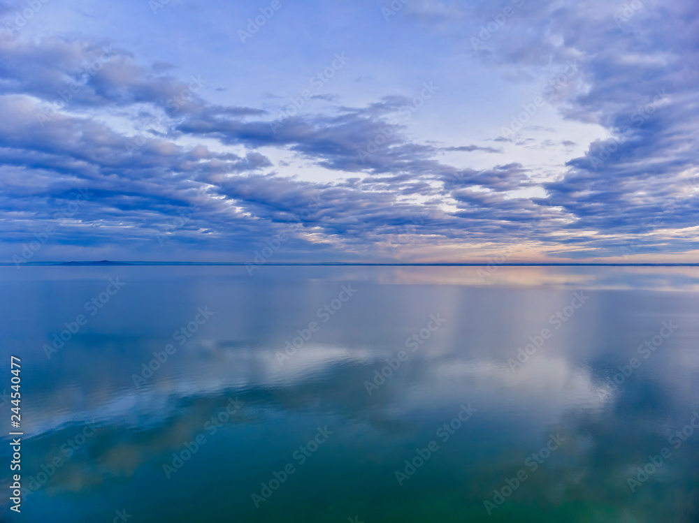Nice clouds reflection on the lake Balaton in Hungary
