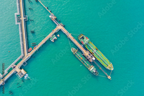 Aerial top view of the ship carrying the lpg and oil tanker in the sea port. For energy export and import business for transportation © Sunday Stock
