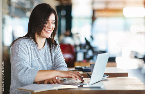 Business woman using laptop