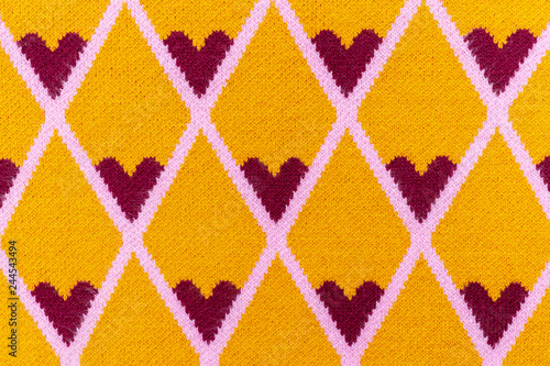 Hearts pattern on yellow fabric
