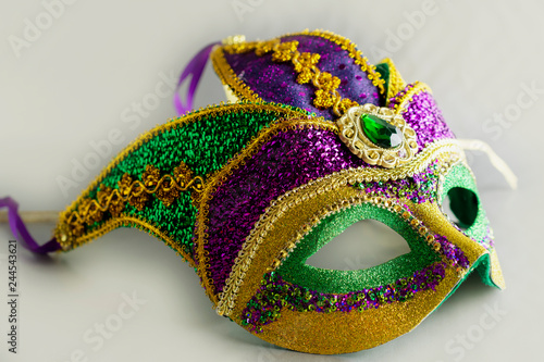 Jester mask with large gem. Object only. No people. White background.