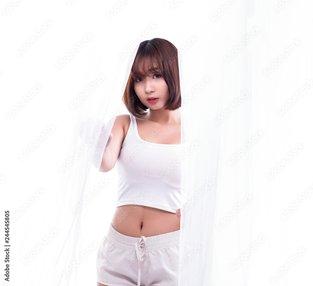 Lady girl standing behind the curtain, Her looking, white background. Lady girl standing behind the curtain, Her looking, white background.