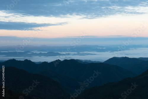 Silhouette mountain layers with sea of fog  sky  cloud and sunrise at Khun Yuam  Mae Hong Son  Thailand
