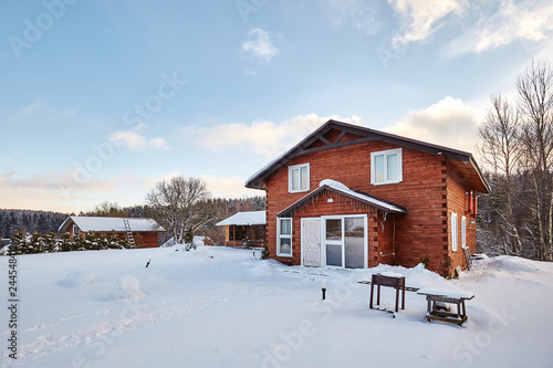 Winter house on winter snowy panoramic landscape © dimaris